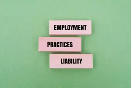 Event company HR team discussing EPL insurance coverage for wrongful termination and discrimination claims