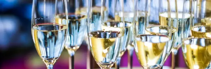 Bartender serving drinks at a wedding reception with liquor liability insurance protection